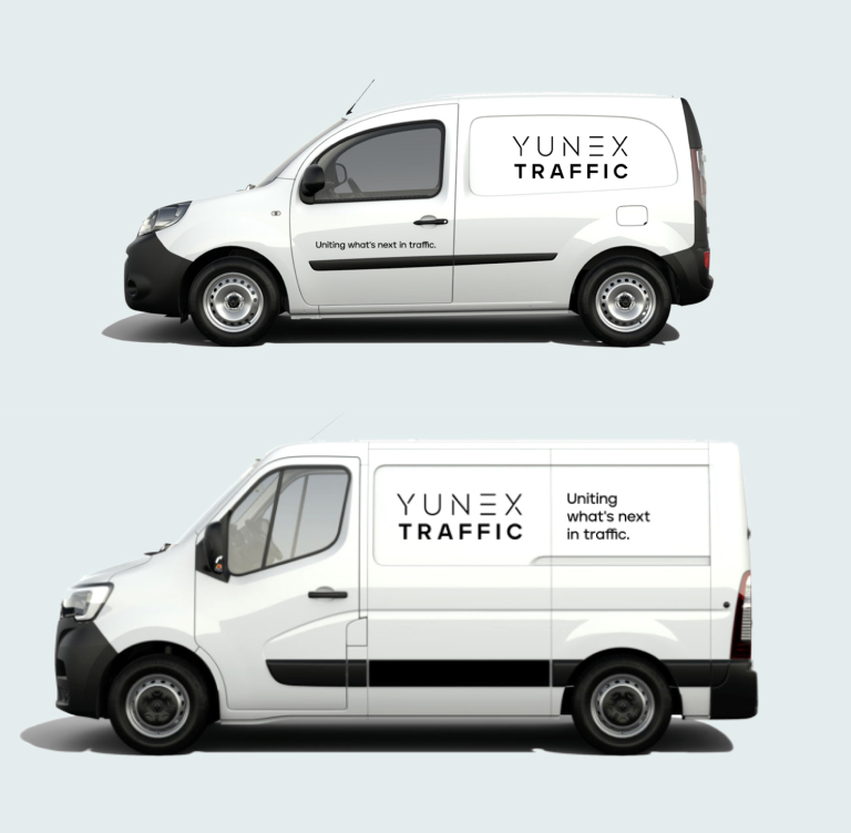 Picture shows two vans with Yunex print